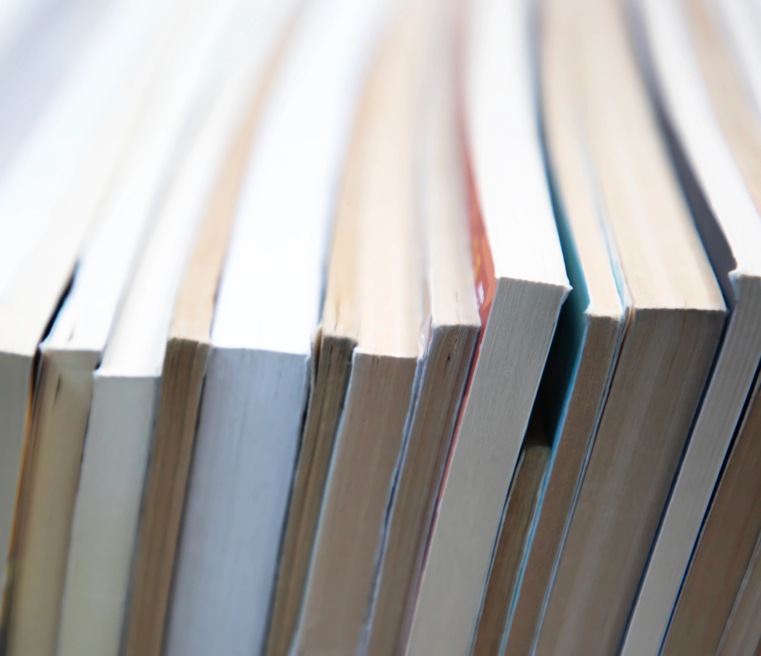 Stacked books representing featured titles